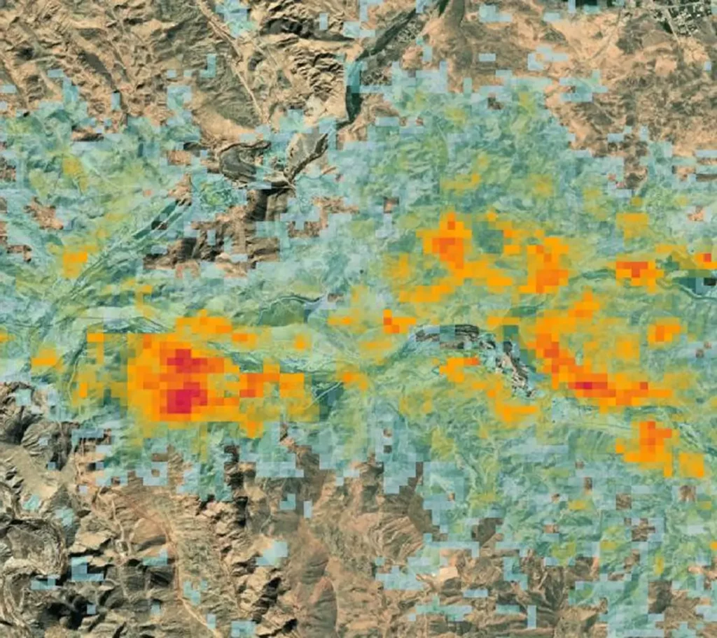 SAR radar satellite data showing surface deformation and emission intensity heatmap over arid terrain – Sensing PLUM platform